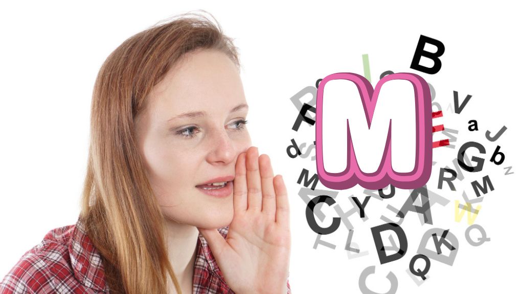 A close-up of a person pronouncing the American M sound, with lips gently pressed together and a relaxed facial expression.